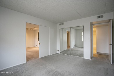 Overlooking a sparkling pool, this stylish open concept, N/S on Scottsdale Shadows in Arizona - for sale on GolfHomes.com, golf home, golf lot