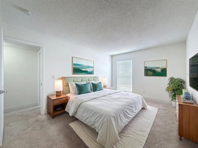 Discover this charming two-bedroom, two-bathroom condo in the on East Bay Golf Club in Florida - for sale on GolfHomes.com, golf home, golf lot