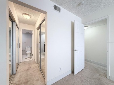 Discover this charming two-bedroom, two-bathroom condo in the on East Bay Golf Club in Florida - for sale on GolfHomes.com, golf home, golf lot