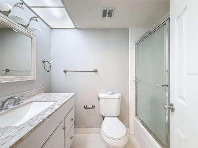 Discover this charming two-bedroom, two-bathroom condo in the on East Bay Golf Club in Florida - for sale on GolfHomes.com, golf home, golf lot