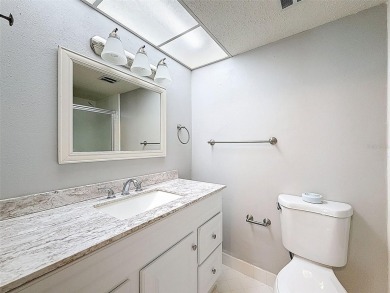 Discover this charming two-bedroom, two-bathroom condo in the on East Bay Golf Club in Florida - for sale on GolfHomes.com, golf home, golf lot