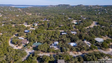 Nestled in a serene setting, this classic rustic home in the on Canyon Lake Golf Club in Texas - for sale on GolfHomes.com, golf home, golf lot