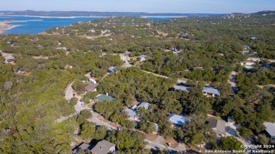 Nestled in a serene setting, this classic rustic home in the on Canyon Lake Golf Club in Texas - for sale on GolfHomes.com, golf home, golf lot