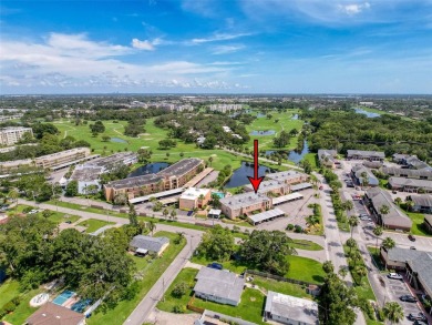 Discover this charming two-bedroom, two-bathroom condo in the on East Bay Golf Club in Florida - for sale on GolfHomes.com, golf home, golf lot