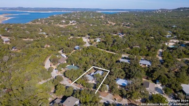 Nestled in a serene setting, this classic rustic home in the on Canyon Lake Golf Club in Texas - for sale on GolfHomes.com, golf home, golf lot