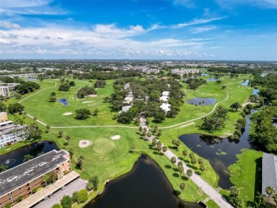 Discover this charming two-bedroom, two-bathroom condo in the on East Bay Golf Club in Florida - for sale on GolfHomes.com, golf home, golf lot