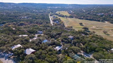 Nestled in a serene setting, this classic rustic home in the on Canyon Lake Golf Club in Texas - for sale on GolfHomes.com, golf home, golf lot