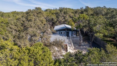 Nestled in a serene setting, this classic rustic home in the on Canyon Lake Golf Club in Texas - for sale on GolfHomes.com, golf home, golf lot