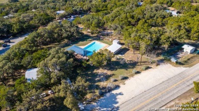 Nestled in a serene setting, this classic rustic home in the on Canyon Lake Golf Club in Texas - for sale on GolfHomes.com, golf home, golf lot