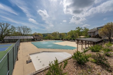 Welcome to your serene retreat at Pointe Royale Golf Village on Pointe Royale Village Country Club in Missouri - for sale on GolfHomes.com, golf home, golf lot