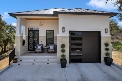 Welcome to 711 Twin Sails, where stunning views of Lake LBJ on Slick Rock Golf Course - Horseshoe Bay in Texas - for sale on GolfHomes.com, golf home, golf lot