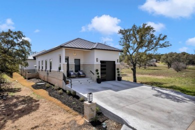Welcome to 711 Twin Sails, where stunning views of Lake LBJ on Slick Rock Golf Course - Horseshoe Bay in Texas - for sale on GolfHomes.com, golf home, golf lot