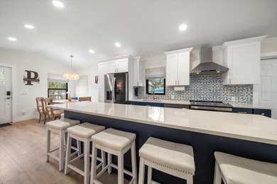 Beautifully Updated Home with Detached Cottage (ADU) IN COVETED on The Dunedin Country Club in Florida - for sale on GolfHomes.com, golf home, golf lot