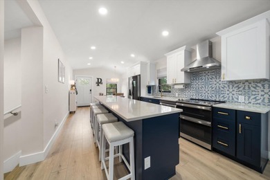 Beautifully Updated Home with Detached Cottage (ADU) IN COVETED on The Dunedin Country Club in Florida - for sale on GolfHomes.com, golf home, golf lot