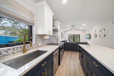 Beautifully Updated Home with Detached Cottage (ADU) IN COVETED on The Dunedin Country Club in Florida - for sale on GolfHomes.com, golf home, golf lot