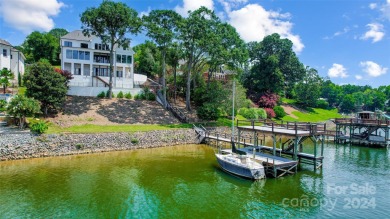 Indulge in lakeside luxury within this meticulously renovated on Tega Cay Golf Club in South Carolina - for sale on GolfHomes.com, golf home, golf lot