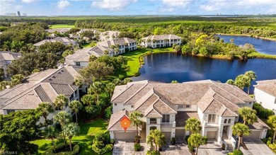 This stunning southern-exposure end unit offers some of the most on West Bay Beach and Golf Club in Florida - for sale on GolfHomes.com, golf home, golf lot