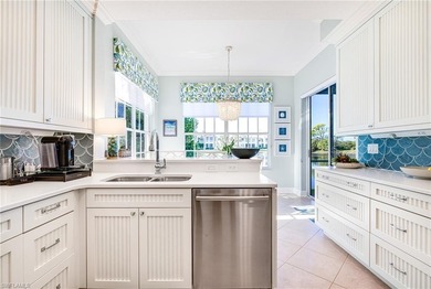 This stunning southern-exposure end unit offers some of the most on West Bay Beach and Golf Club in Florida - for sale on GolfHomes.com, golf home, golf lot