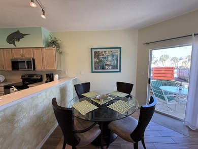 STEPS TO THE BEACH | TURNKEY RENTAL OPPORTUNITY! Welcome to 775 on Sandpiper Cove Golf Course in Florida - for sale on GolfHomes.com, golf home, golf lot