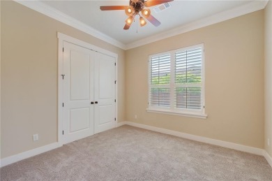 Nestled on a spacious 0.58-acre lot near the Traditions Club on The Traditions Club At Texas A and M in Texas - for sale on GolfHomes.com, golf home, golf lot