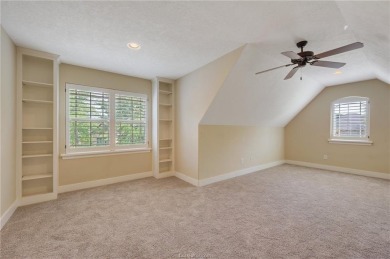 Nestled on a spacious 0.58-acre lot near the Traditions Club on The Traditions Club At Texas A and M in Texas - for sale on GolfHomes.com, golf home, golf lot