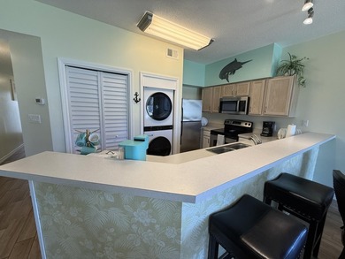 STEPS TO THE BEACH | TURNKEY RENTAL OPPORTUNITY! Welcome to 775 on Sandpiper Cove Golf Course in Florida - for sale on GolfHomes.com, golf home, golf lot