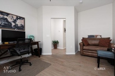 Beautiful 2-bedroom, 2-bath home with a versatile den that's on Conestoga Golf Club in Nevada - for sale on GolfHomes.com, golf home, golf lot