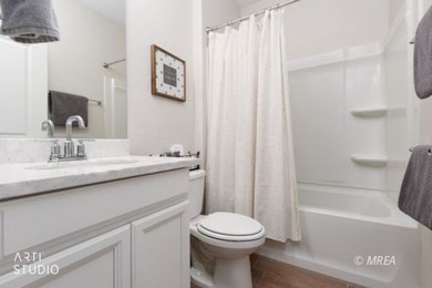 Beautiful 2-bedroom, 2-bath home with a versatile den that's on Conestoga Golf Club in Nevada - for sale on GolfHomes.com, golf home, golf lot