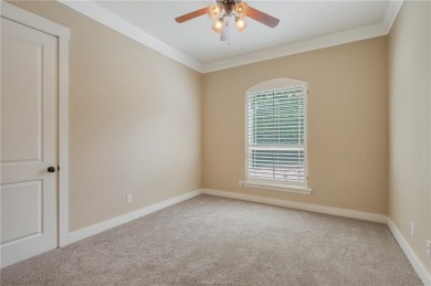 Nestled on a spacious 0.58-acre lot near the Traditions Club on The Traditions Club At Texas A and M in Texas - for sale on GolfHomes.com, golf home, golf lot