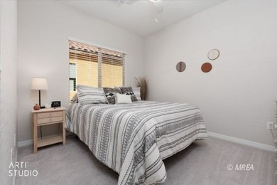 Beautiful 2-bedroom, 2-bath home with a versatile den that's on Conestoga Golf Club in Nevada - for sale on GolfHomes.com, golf home, golf lot