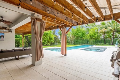 Gorgeous single story 3 bedroom 2 bath home w/custom pool/spa on Parkland Golf Club in Florida - for sale on GolfHomes.com, golf home, golf lot