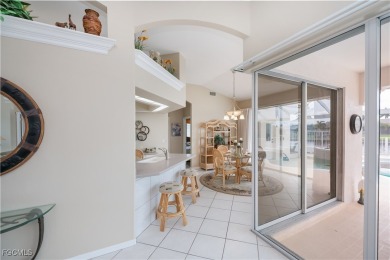 From the moment you walk in the door you are greeted with the on Royal Tee Country Club in Florida - for sale on GolfHomes.com, golf home, golf lot
