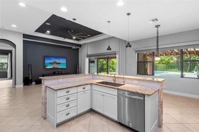 Gorgeous single story 3 bedroom 2 bath home w/custom pool/spa on Parkland Golf Club in Florida - for sale on GolfHomes.com, golf home, golf lot