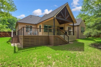 Nestled on a spacious 0.58-acre lot near the Traditions Club on The Traditions Club At Texas A and M in Texas - for sale on GolfHomes.com, golf home, golf lot