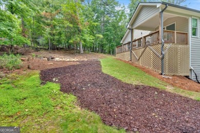 Live like you are on vacation every day or make this your on The Highlands Course at Lake Arrowhead in Georgia - for sale on GolfHomes.com, golf home, golf lot