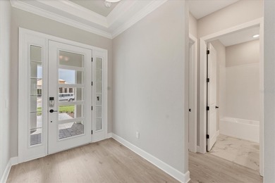 One or more photo(s) has been virtually staged on Esplanade Golf and Country at Lakewood Ranch in Florida - for sale on GolfHomes.com, golf home, golf lot