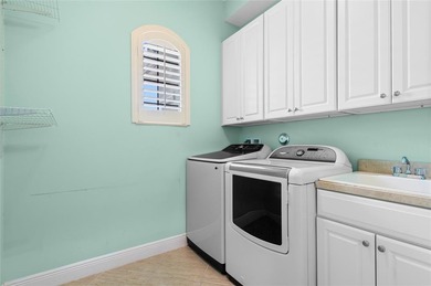 Gorgeous single story 3 bedroom 2 bath home w/custom pool/spa on Parkland Golf Club in Florida - for sale on GolfHomes.com, golf home, golf lot