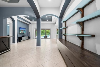 Gorgeous single story 3 bedroom 2 bath home w/custom pool/spa on Parkland Golf Club in Florida - for sale on GolfHomes.com, golf home, golf lot