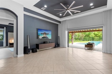 Gorgeous single story 3 bedroom 2 bath home w/custom pool/spa on Parkland Golf Club in Florida - for sale on GolfHomes.com, golf home, golf lot