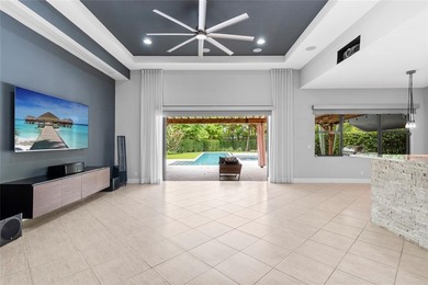 Gorgeous single story 3 bedroom 2 bath home w/custom pool/spa on Parkland Golf Club in Florida - for sale on GolfHomes.com, golf home, golf lot