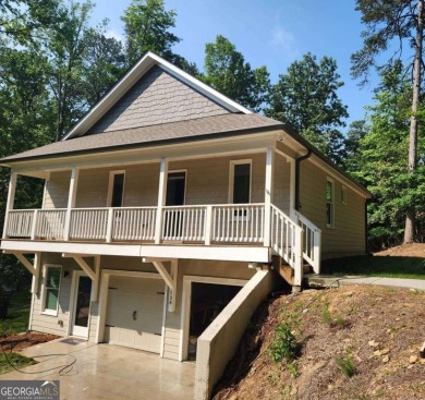 Live like you are on vacation every day or make this your on The Highlands Course at Lake Arrowhead in Georgia - for sale on GolfHomes.com, golf home, golf lot