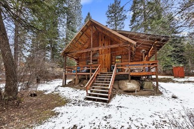 Beautiful 1,244 sq. ft. log home offering 2 bed/1 bath, with on Terrace Lakes Golf Resort in ID - for sale on GolfHomes.com, golf home, golf lot