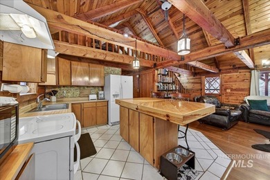 Beautiful 1,244 sq. ft. log home offering 2 bed/1 bath, with on Terrace Lakes Golf Resort in ID - for sale on GolfHomes.com, golf home, golf lot
