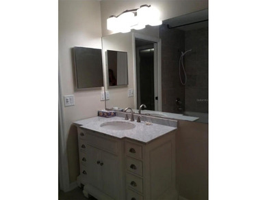 Welcome to this beautifully updated 2-bedroom, 2-bath condo on Seven Springs Golf and Country Club in Florida - for sale on GolfHomes.com, golf home, golf lot