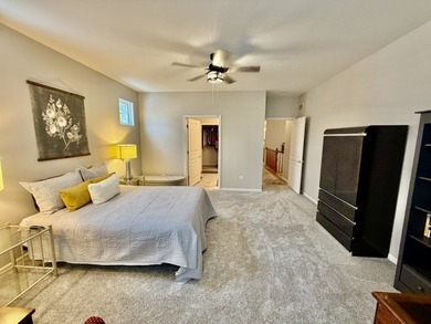 Delightful, sun-filled ranch with a finished basement nestled in on Carillon Lakes 3 Hole Course in Illinois - for sale on GolfHomes.com, golf home, golf lot