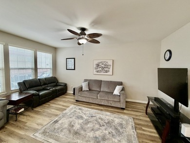 Delightful, sun-filled ranch with a finished basement nestled in on Carillon Lakes 3 Hole Course in Illinois - for sale on GolfHomes.com, golf home, golf lot