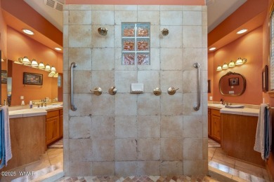Overlooking the lush fairways and a tranquil water feature of on Torreon Golf Club in Arizona - for sale on GolfHomes.com, golf home, golf lot
