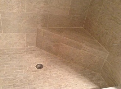 Welcome to this beautifully updated 2-bedroom, 2-bath condo on Seven Springs Golf and Country Club in Florida - for sale on GolfHomes.com, golf home, golf lot