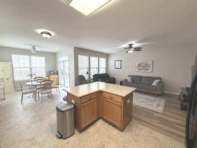 Delightful, sun-filled ranch with a finished basement nestled in on Carillon Lakes 3 Hole Course in Illinois - for sale on GolfHomes.com, golf home, golf lot