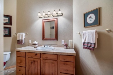 Overlooking the lush fairways and a tranquil water feature of on Torreon Golf Club in Arizona - for sale on GolfHomes.com, golf home, golf lot